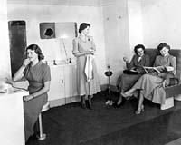 'b08-27 -   - Victorian & South Australian Railway Joint first class sitting car interior showing the women toilet area.(South Australian Railways)'