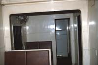 'cd_p0109924 - 11<sup>th</sup> July 1990 - Port Pirie car barn - sleeper BRB 86 kitchen and Dining area'